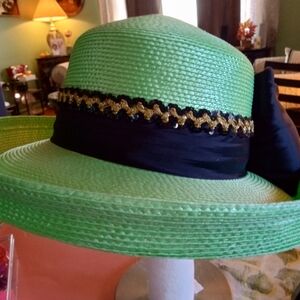 Elegant Green Wide-Brim Hat with Black and Gold Accents